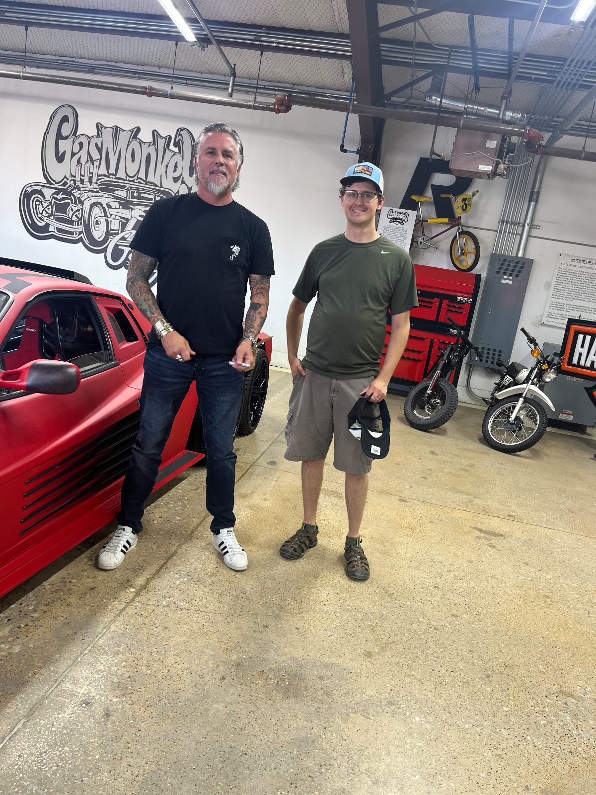 Zachary Thompson with Richard Rawlings at Gas Monkey Garage