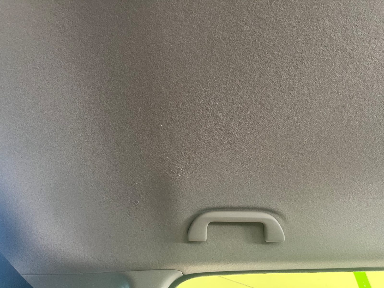 Interior detailing — freshly cleaned car headliner and cabin