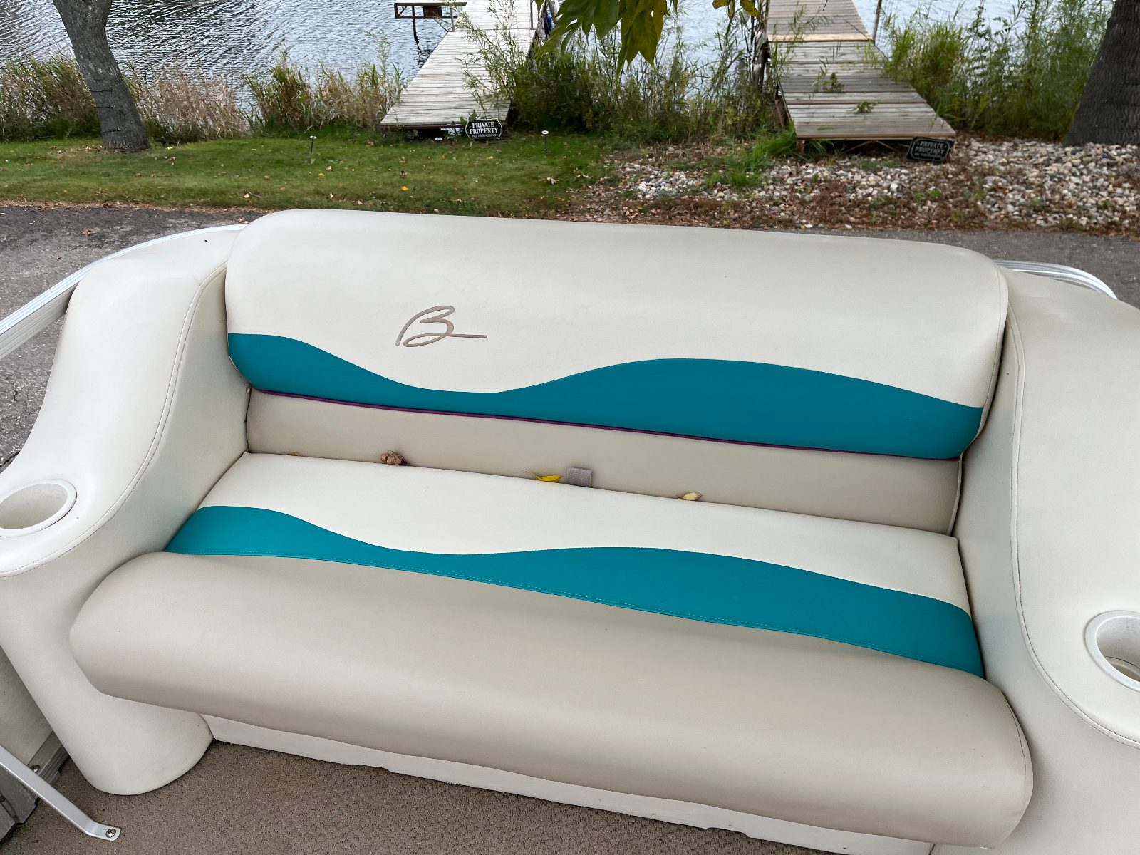 Detailed Bennington pontoon seats back at the lake