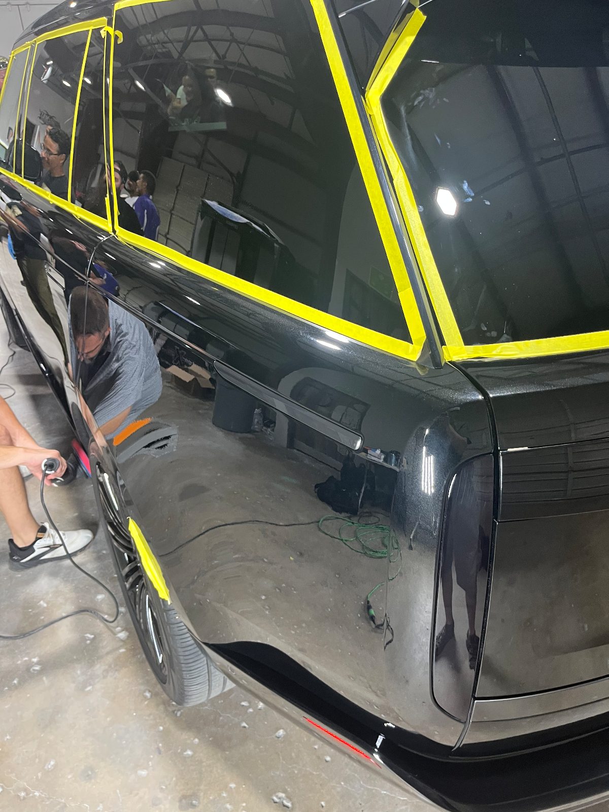 Machine polishing a black panel to a gloss finish